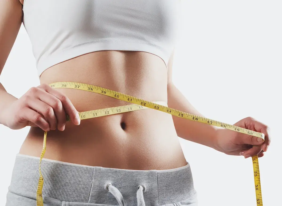 Patient measuring weight loss results from TrimBody M.D. programs